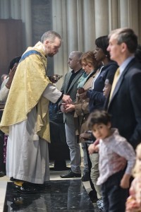 Receiving communion at St. James's